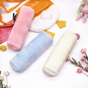 Quilted plush pencil cases in pink, blue, and beige with soft texture and side zippers