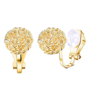 Detail of gold braided sphere ear clips with comfortable clear silicone pads on white