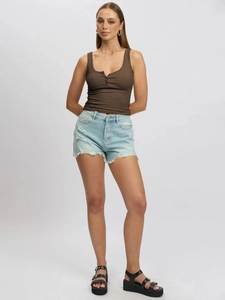 Slim fit U-neck ribbed tank top in dark brown styled with denim shorts and sandals