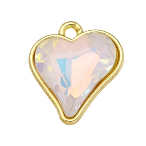 Detailed view of heart-shaped crystal pendant with gold frame and iridescent glass finish