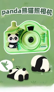 Close-up of green panda toy camera featuring a 3D panda design and bamboo relief details