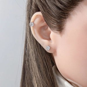 Silver snowflake star ear stud earrings with inlaid cubic zirconia for a minimalist look