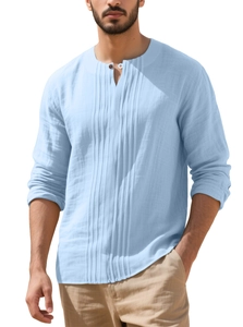 Detail of light blue linen Henley shirt featuring vertical pleats and cotton texture