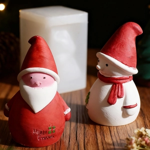 DIY Christmas Santa and snowman silicone molds with finished colorful plaster ornaments