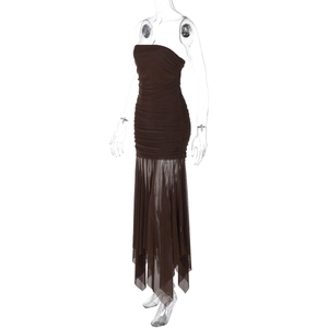 Detail view of the deep brown ruched tube dress with irregular sheer mesh patchwork hem