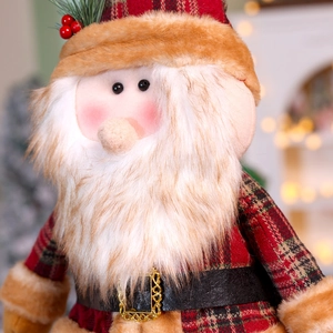 Close-up of standing Santa Claus doll with long fur beard and plaid hat detail