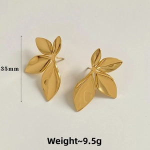 Detailed view of gold leaf stud earrings measuring 35mm height and weighing 9.5g