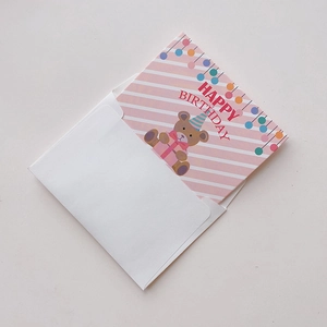 Pink striped birthday card with teddy bear illustration and white envelope set