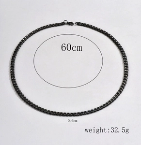 Detail view of black stainless steel chain necklace showing 60cm length and 0.6cm width