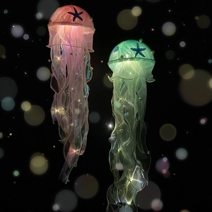 DIY handmade jellyfish lights with fabric tentacles and starfish in pink and green
