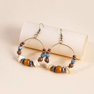 Bohemian beaded hoop earrings with turquoise accents and shell charms for women