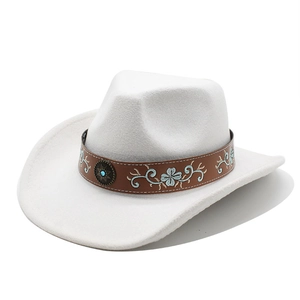 Detail of cream cowboy hat featuring brown leather band with blue floral embroidery