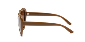 Detail view of heart-shaped sunglasses featuring brown lenses and plastic frame