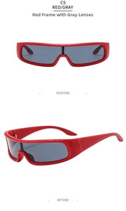 Detail of sand red frame sports sunglasses with gray lenses and wrap around design