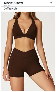 Detail of coffee brown yoga set with deep V-neck sports bra and crossover high waist shorts