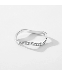 Macro detail of silver S925 sterling silver wave ring with micro-set shimmering diamonds