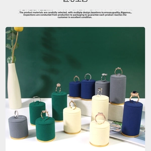 Microfiber velvet jewelry stands with gold metal bases in various heights and colors