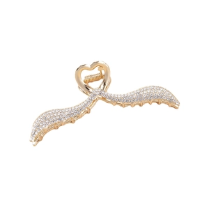 Golden alloy shark hair claw with angel wings and rhinestone heart design for women