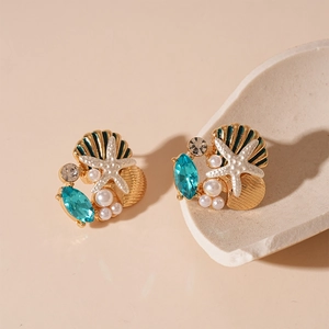Boucles d'oreilles marine avec étoile de mer, perles et cristaux bleu océan