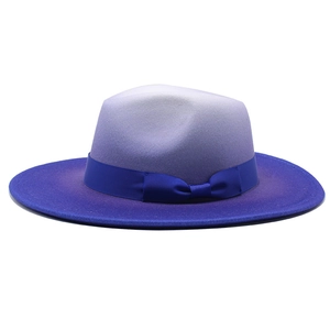Close-up of wool fedora hat with purple to blue gradient finish and ribbon detail