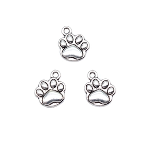 Three silver paw print charms for DIY necklaces and bracelets on a clean white background
