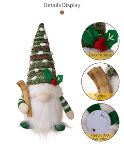 Detailed views of lighted Christmas gnome with knitted hat, wooden sledge, and battery case