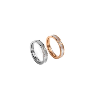 Minimalist titanium steel couple rings with white shell inlay and sparkling zircons