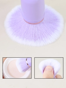 Macro shot of purple gradient bristles showing high powder pick-up and soft texture