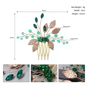 Detail view of bridal hair comb with green beads and gold leaves, size 9cm x 8.2cm