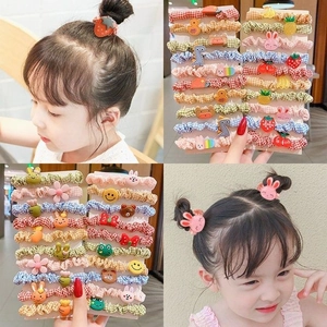 Plaid fabric children scrunchies set with cartoon bunny and strawberry decorations