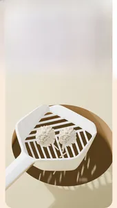 Cat litter shovel featuring wide hollow slats for fast sifting and efficient waste removal