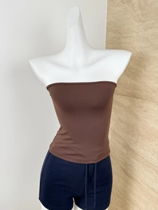 Detailed front view of a seamless brown knitted tube top on a white female mannequin