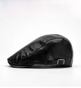 Detailed side view of black PU leather flat cap showing fine texture and metal buckle