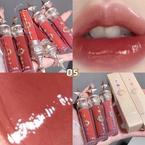 Macro shot of shade 05 liquid lip glaze with glossy finish and starry wand packaging