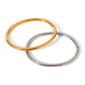 Minimalist stainless steel bangle set in 18K gold and silver with a polished mirror finish