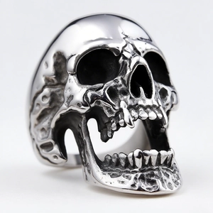 Macro shot of gothic zombie skull ring with antique finish and intricate bone details
