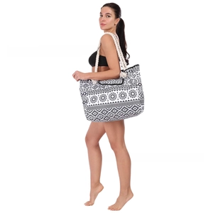 Detail of the high-density canvas tote with black and white tribal patterns and rope handles