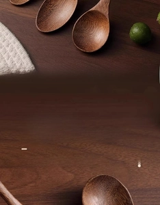 Detail of natural wenge wood spoon showing unique grain texture and smooth finish