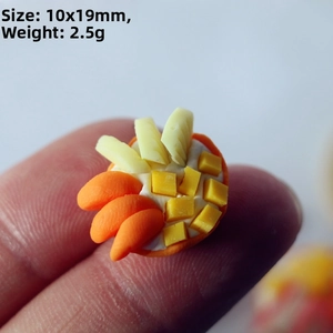 Miniature dollhouse curry rice bowl detail shown between fingers for 10x19mm scale
