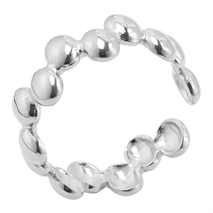 Detail view of the silver beaded bubble design on the adjustable stainless steel open ring