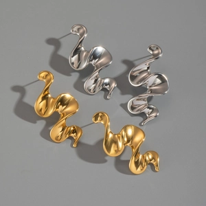 Abstract twisted wavy earrings in 18K gold and silver finishes with artistic shadows