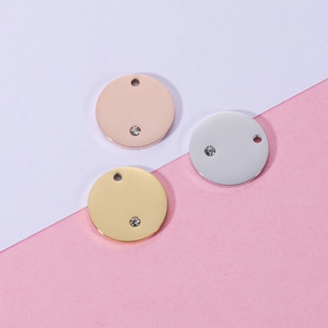 Polished stainless steel round disc pendants with cubic zirconia in gold, silver and rose gold
