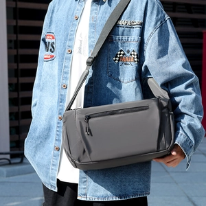 Men's gray waterproof nylon messenger bag with adjustable strap and zipper pocket