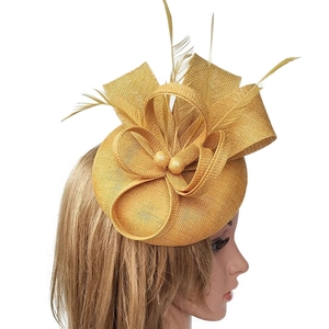 Elegant yellow fascinator hat with woven texture and feather accents for party events