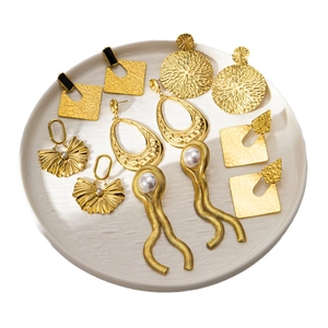 Set of five vintage 18K gold plated earrings with geometric patterns and faux pearls