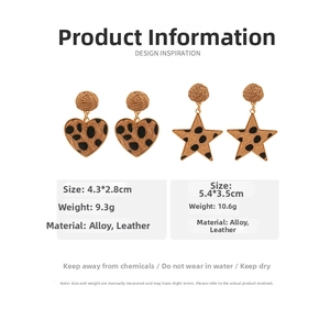 Detail view of leopard print heart and star earrings with dimensions and weight specs