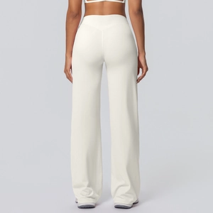 Back view of high-waisted wide-leg yoga pants in cream white soft brushed fabric