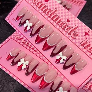 French red press-on nails with 3D bows, pearls and glitter finish in S and M sizes