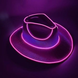 Detail of neon LED glowing pink and purple cowboy hat with EL wire for party and rave events