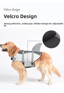 Detail of dog life jacket with secure Velcro system and shark fin design for pet safety